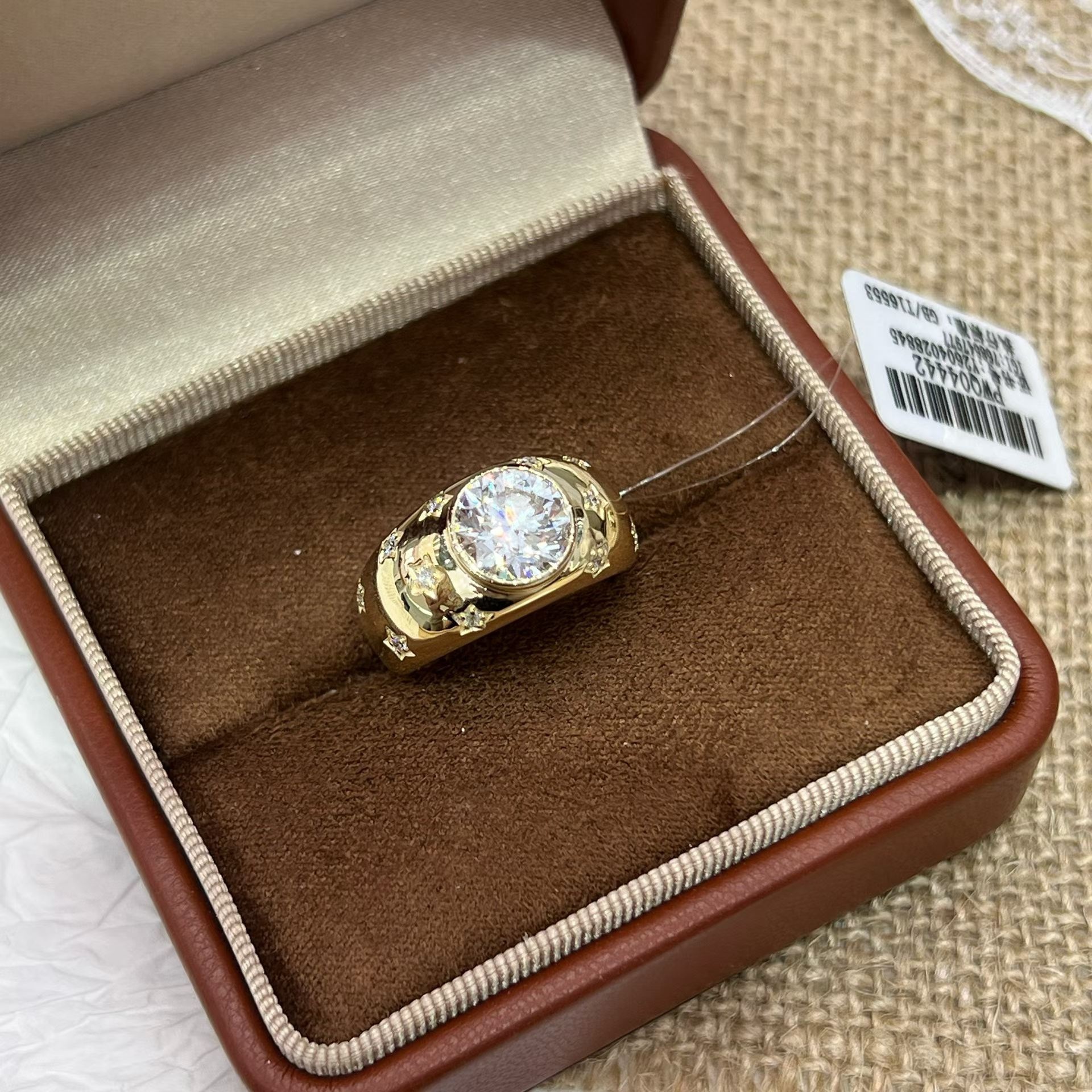 Diamond ring in a jewellery presentation box