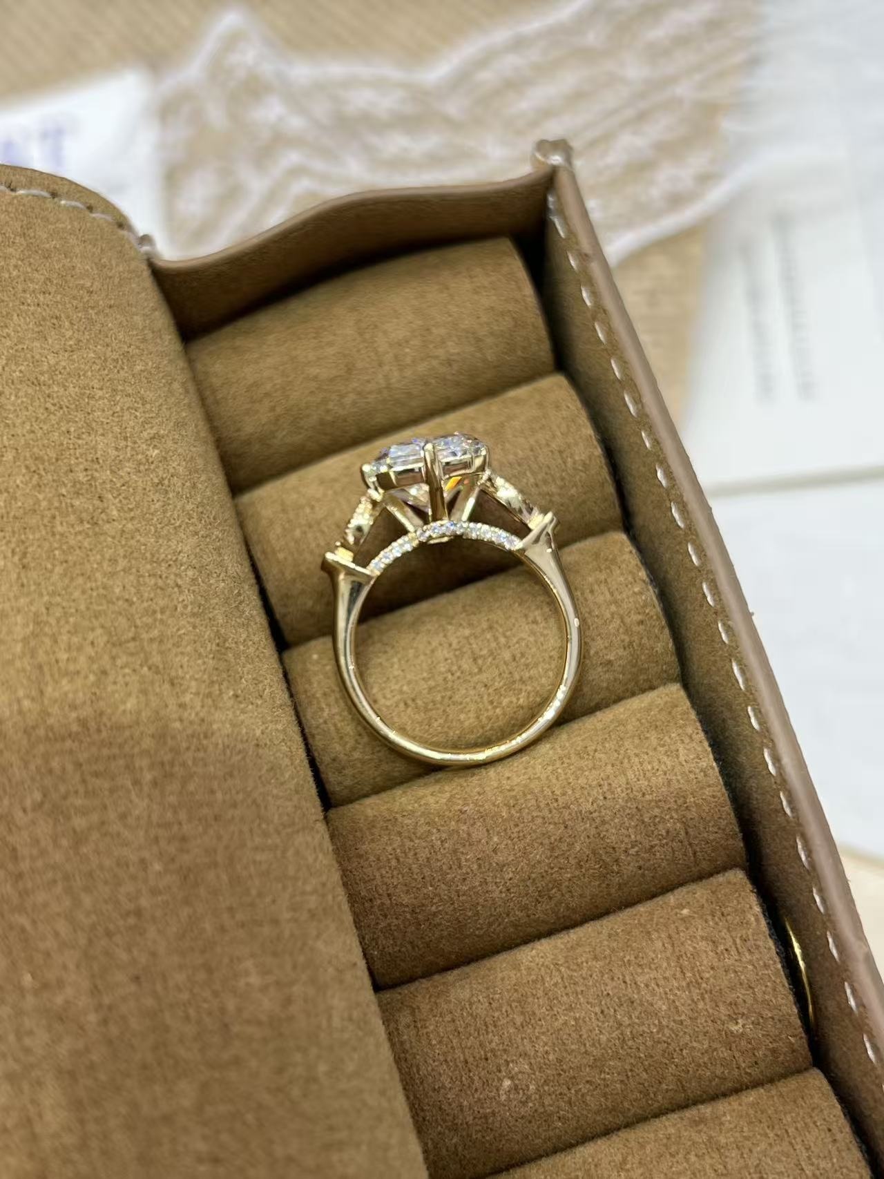 Diamond ring in a velvet jewellery tray